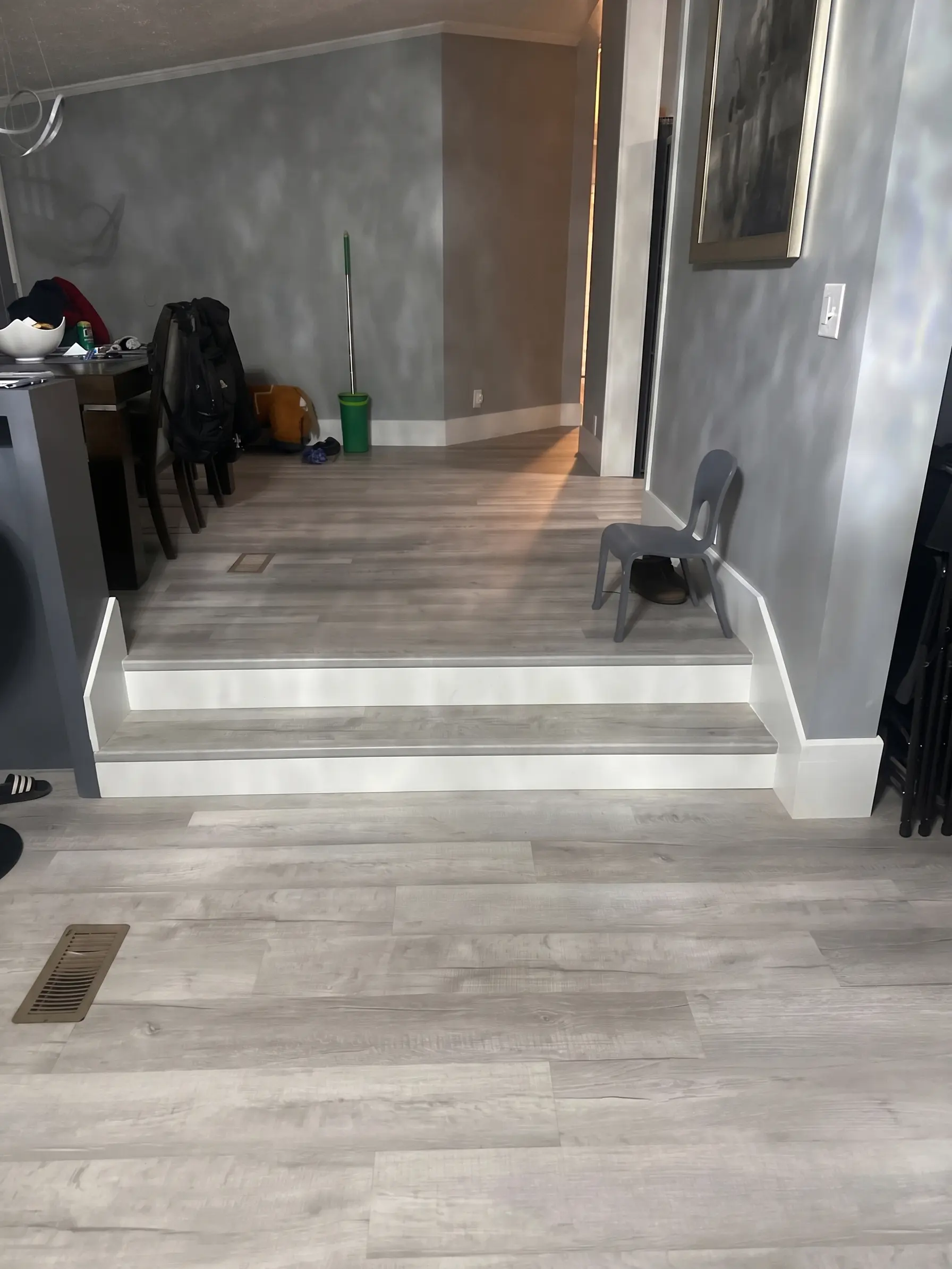 Flooring installation and home repairs by Complete Handy Solutions