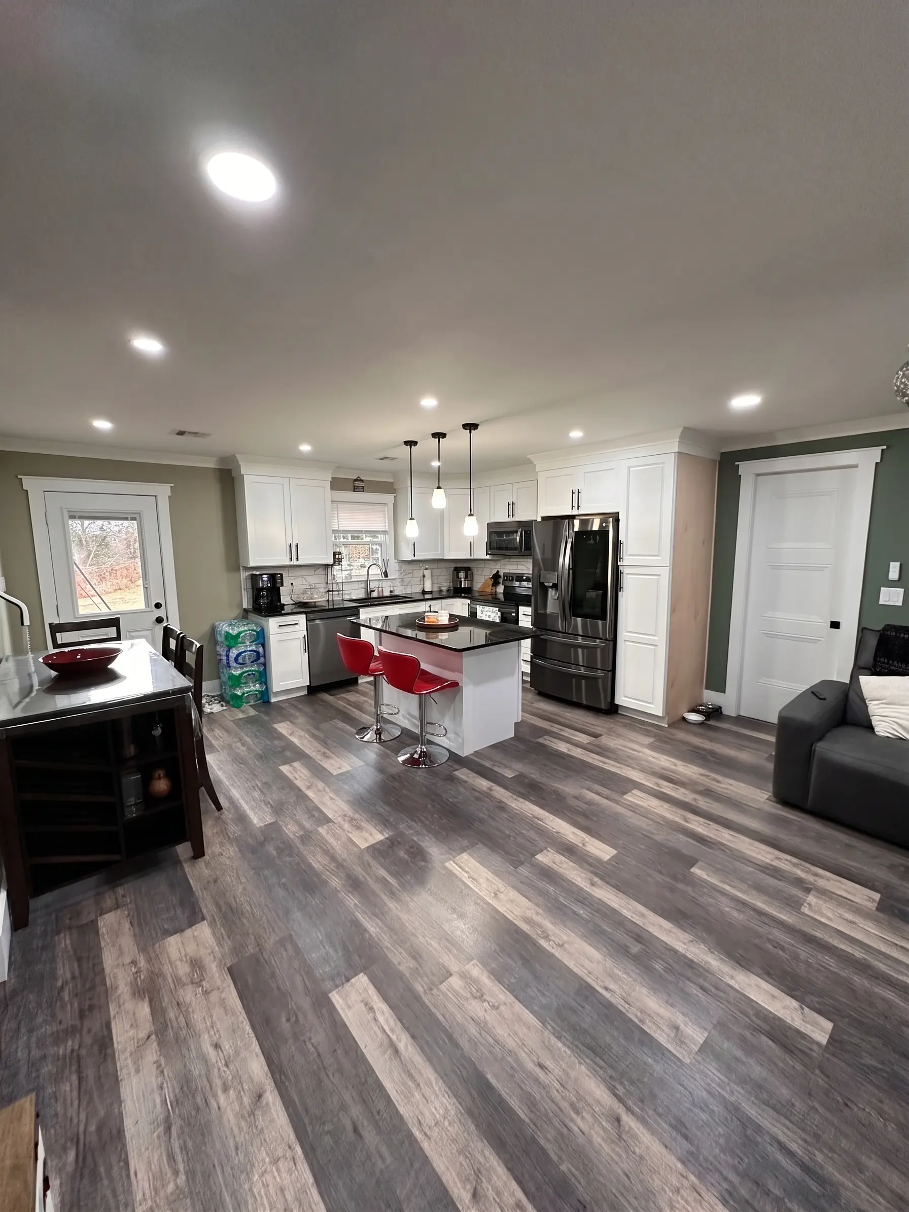 Modern kitchen and dining interior remodel by Complete Handy Solutions