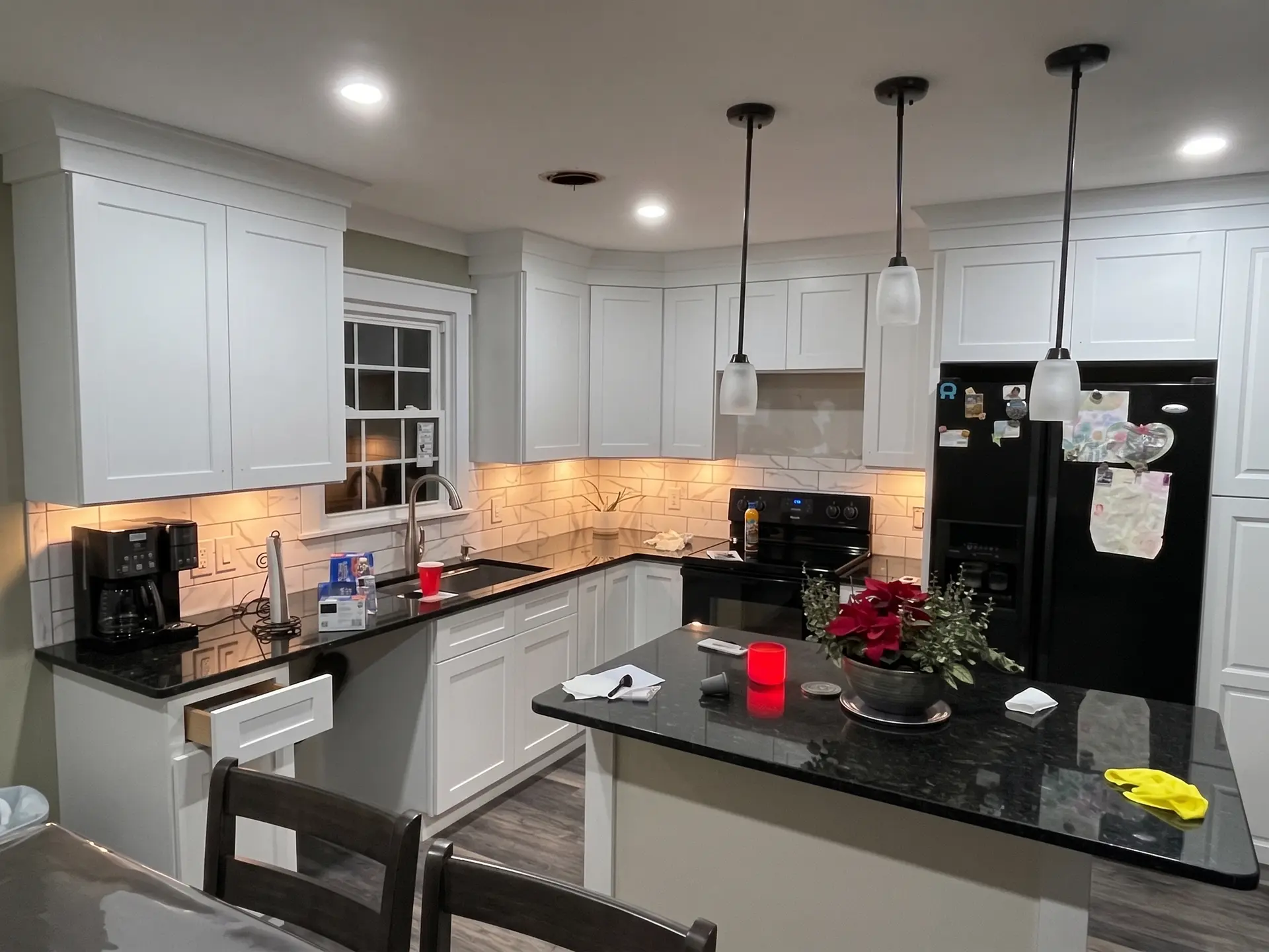 Modern white kitchen renovation by Complete Handy Solutions